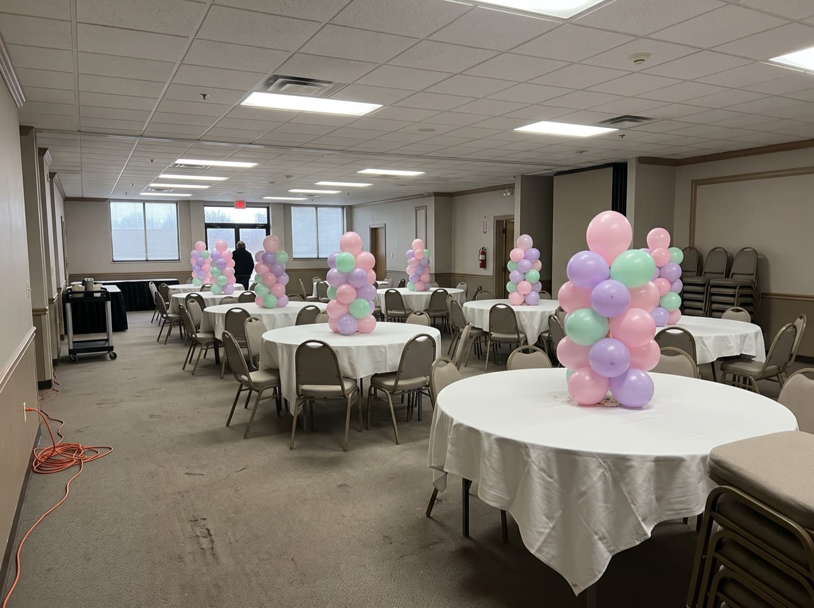 Mini pastel balloon columns as banquet table centerpieces